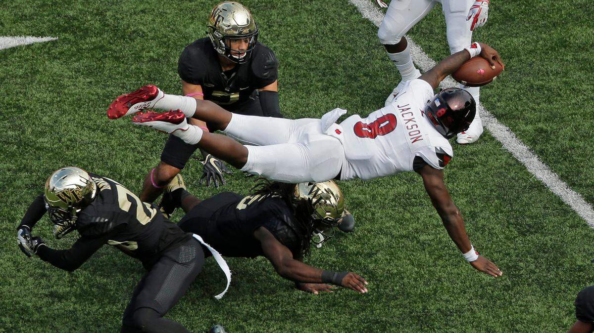 Louisville quarterback Lamar Jackson was selected by the Baltimore Ravens with the final pick in the first round of the NFL Draft on Thursday.