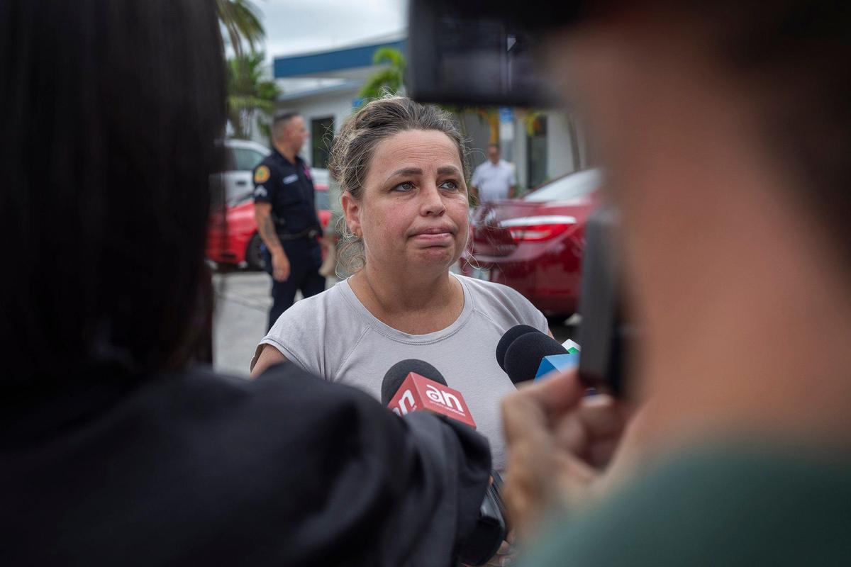 Yanely Paredes talks to the press about her friend, Cuban Reggaeton artist ‘El Taiger,’ who was found shot in the head in a car in Miami on Thursday, Oct. 3, 2014. She spoke at a press conference with Miami police on Friday at Miami City Hall.