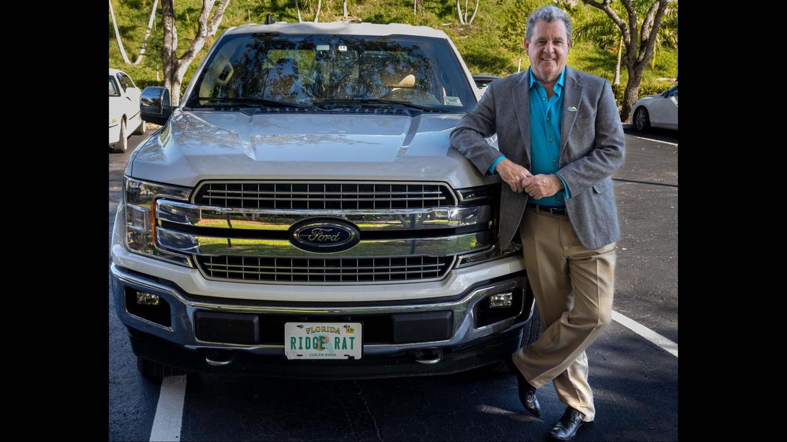 The Mayor of Cutler Bay, Tim Meerbott, poses with his truck bearing a Ridge Rat Florida tag. Ridge Rat is a term used to identify people born and raised in what is now Cutler Bay, Florida, on November 16, 2022