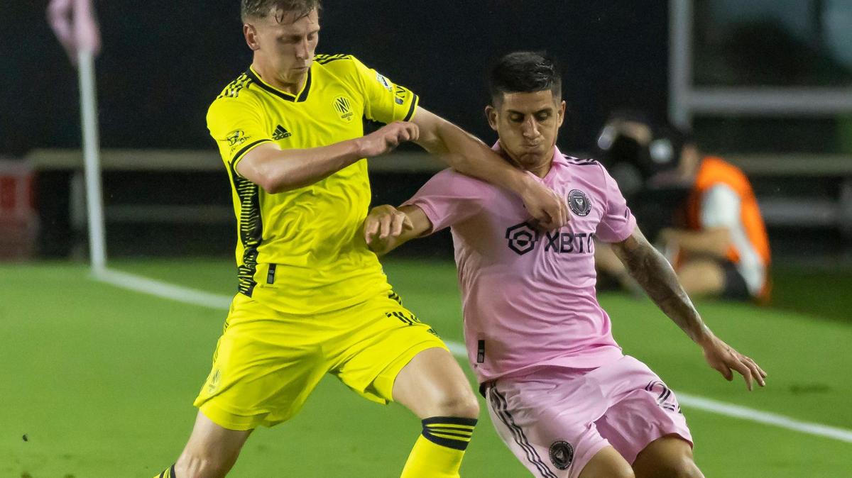 Inter Miami forward Nicolás Stefanelli (22) and Nashville SC forward Jacob Shaffelburg (14) compete for the ball in the second half of their US Open Cup Round of 16 soccer match at DRV PNK Stadium on Tuesday, May 23, 2023, in Fort Lauderdale, Fla.