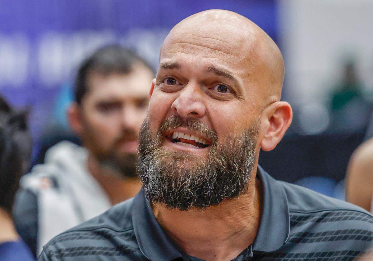 Columbus High School’s head coach Andrew Moran speaks with players during a time out during the game against Seminole High School in the second half of the FHSAA Class 7A Semi-Final for Boys High School Basketball State Championship at the RP Funding Center in Lakeland, Florida on Friday, March 7, 2025.