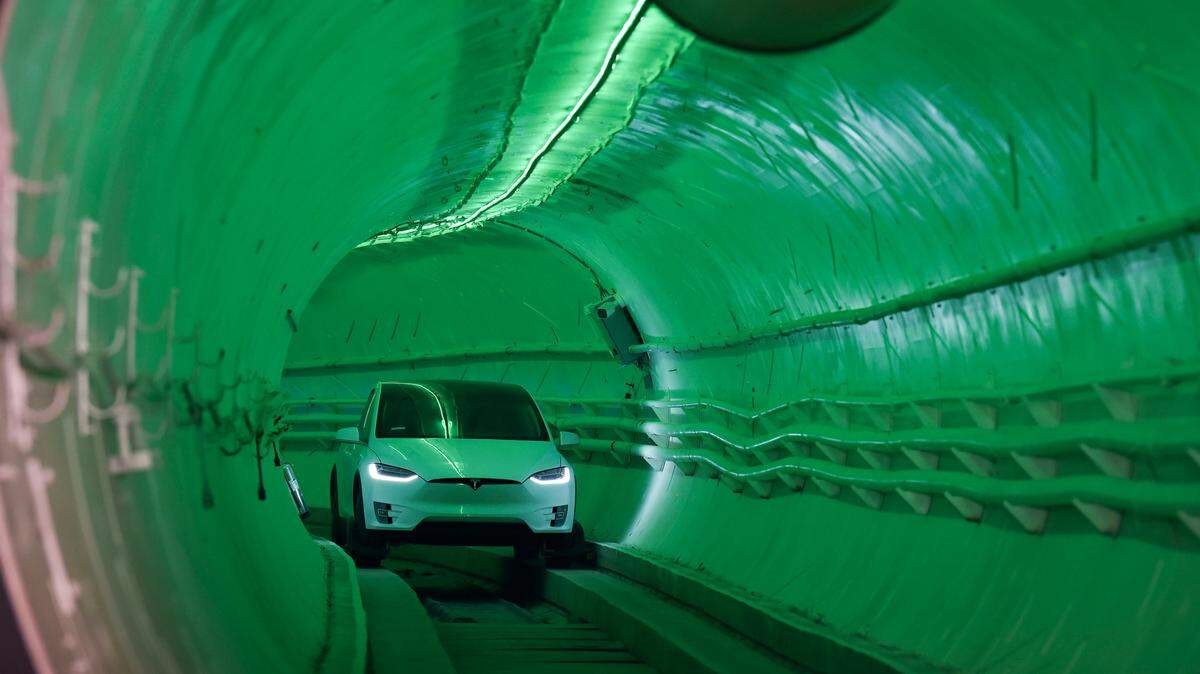 HAWTHORNE, CA - DECEMBER 18: Elon Musk, co-founder and Chief Executive Officer of Tesla Inc., arrives in a modified Tesla Model X electric vehicle during an unveiling event for The Boring Company Hawthorne test tunnel December 18, 2018 in Hawthorne, California. On Tuesday night, The Boring Company will officially open the Hawthorne tunnel, a preview of Musk’s larger vision to ease traffic in Los Angeles. (Photo by Robyn Beck-Pool/Getty Images)