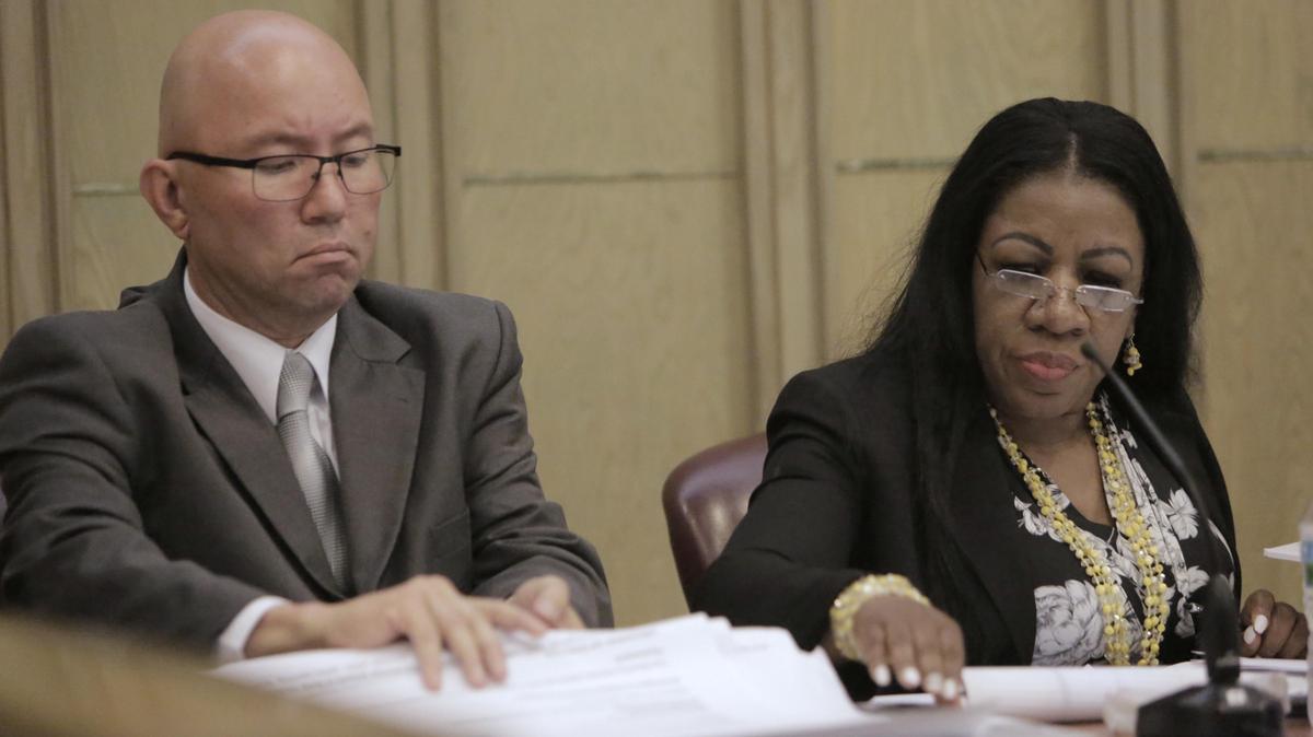 Fired Miami police officer Lester Bohnenblust, left, was sentenced to 45 days in jail and three years of probation for manhandling a nurse during an argument last year.