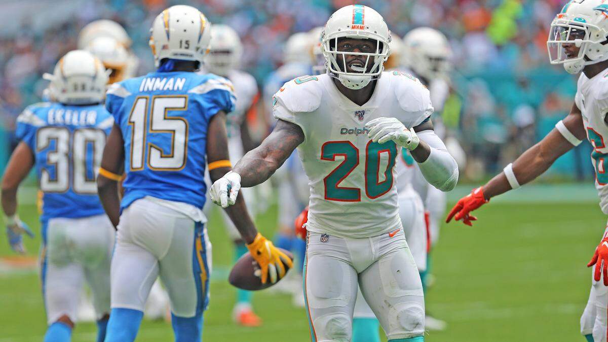 Miami Dolphins safety Reshad Jones (20) reacts after a play during second quarter of an NFL football game against Los Angeles Chargers at Hard Rock Stadium on Sunday, September 29 2019, in Miami Gardens.