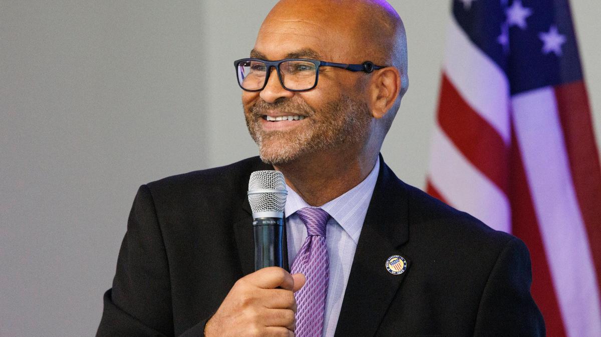 Miami Gardens City Manager Cameron D. Benson smiles at the crowd during the City of Miami Gardens Economic Improvement Summit.