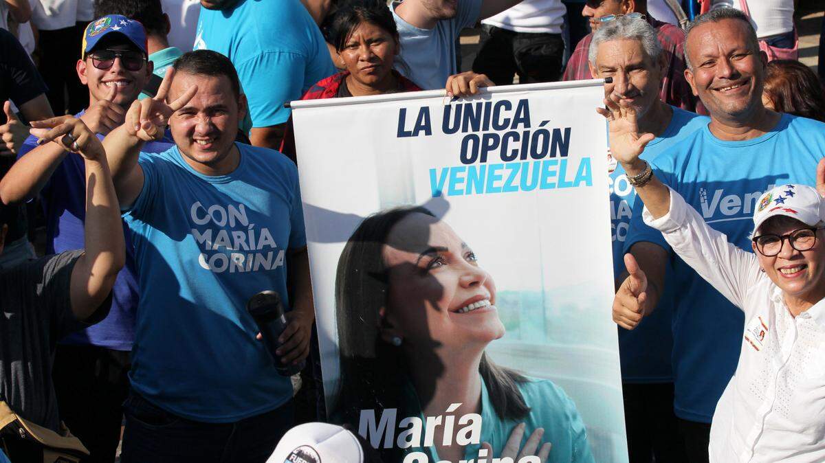 Supporters of leading Venezuelan opposition candidate, Maria Corina Machado, attend an Aug. 11 rally in Marcaibo, Venezuela, seeking to overcome the Maduro regime.
