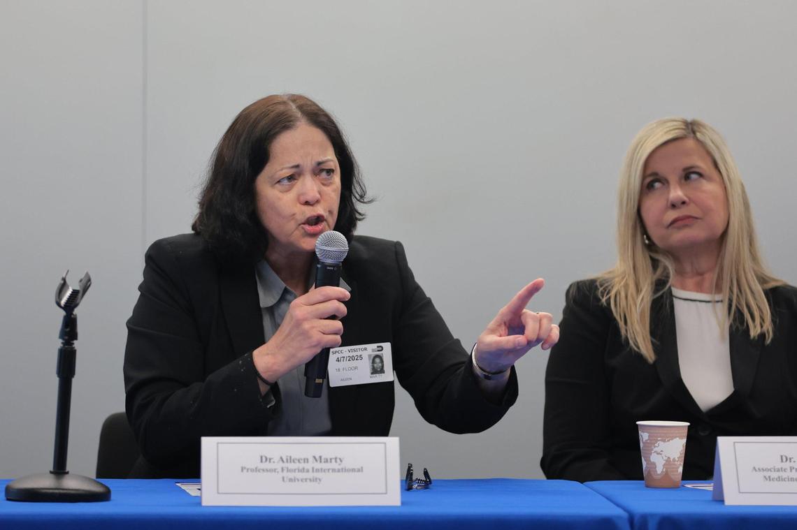 Dr. Aileen Marty, a professor at Florida International University, talks to Miami-Dade Commissioner Roberto J. Gonzalez (not pictured) during a roundtable discussion on water fluoridation at the Stephen P. Clark Government Center in Downtown Miami, Monday, April 7, 2025.
