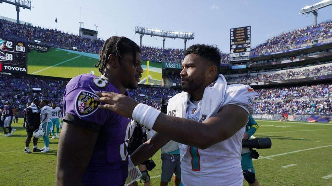 Ravens quarterback Lamar Jackson (left) and Dolphins QB Tua Tagovailoa (right) meet on the field after Miami’s 42-38 NFL victory in Baltimore on September 18, 2022.