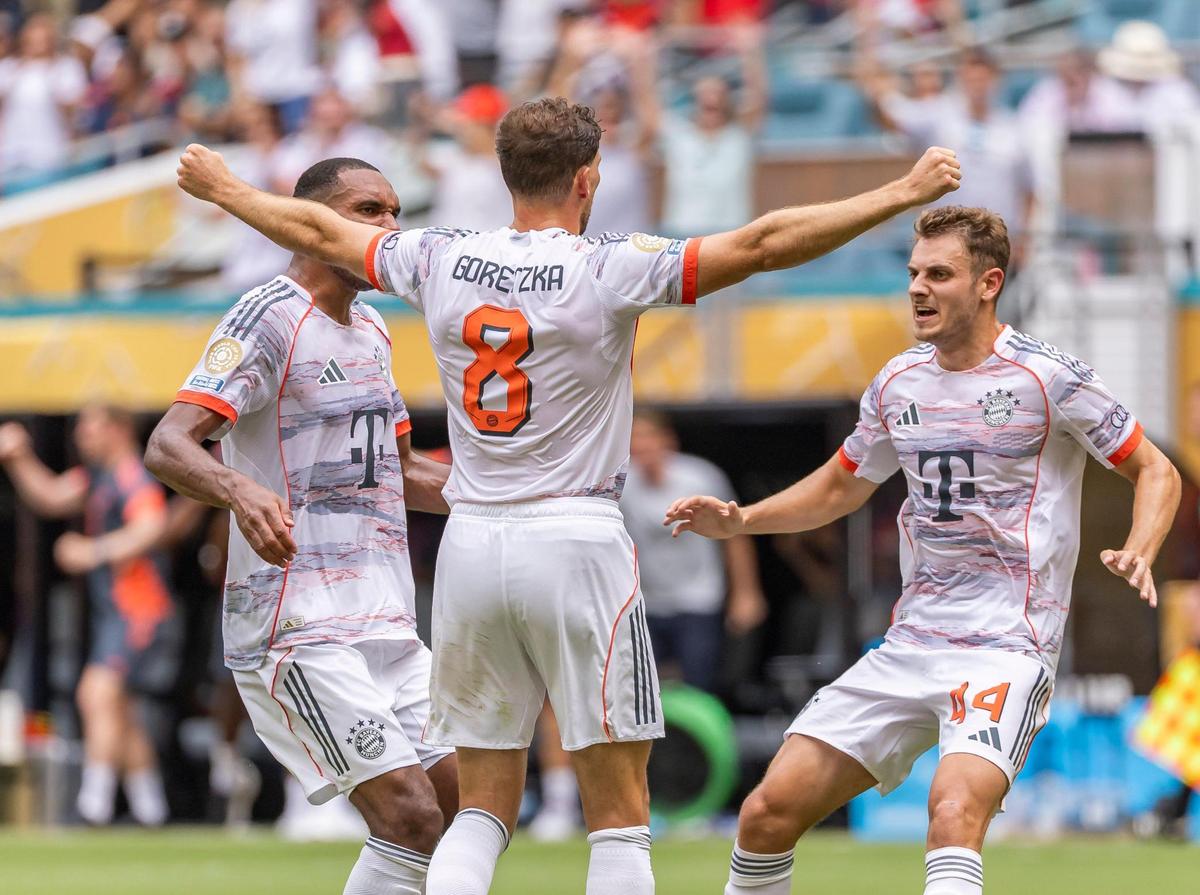 Bayern Munich midfielder Leon Goretzka (8) celebrates with Bayern Munich defenders Dayot Upamecano (2) and Josip Stanisic (44) after scoring a goal against Flamengo in the first half of their round of 16 FIFA Club World Cup soccer match at Hard Rock Stadium on Sunday, June 29, 2025, in Miami Gardens, Fla.