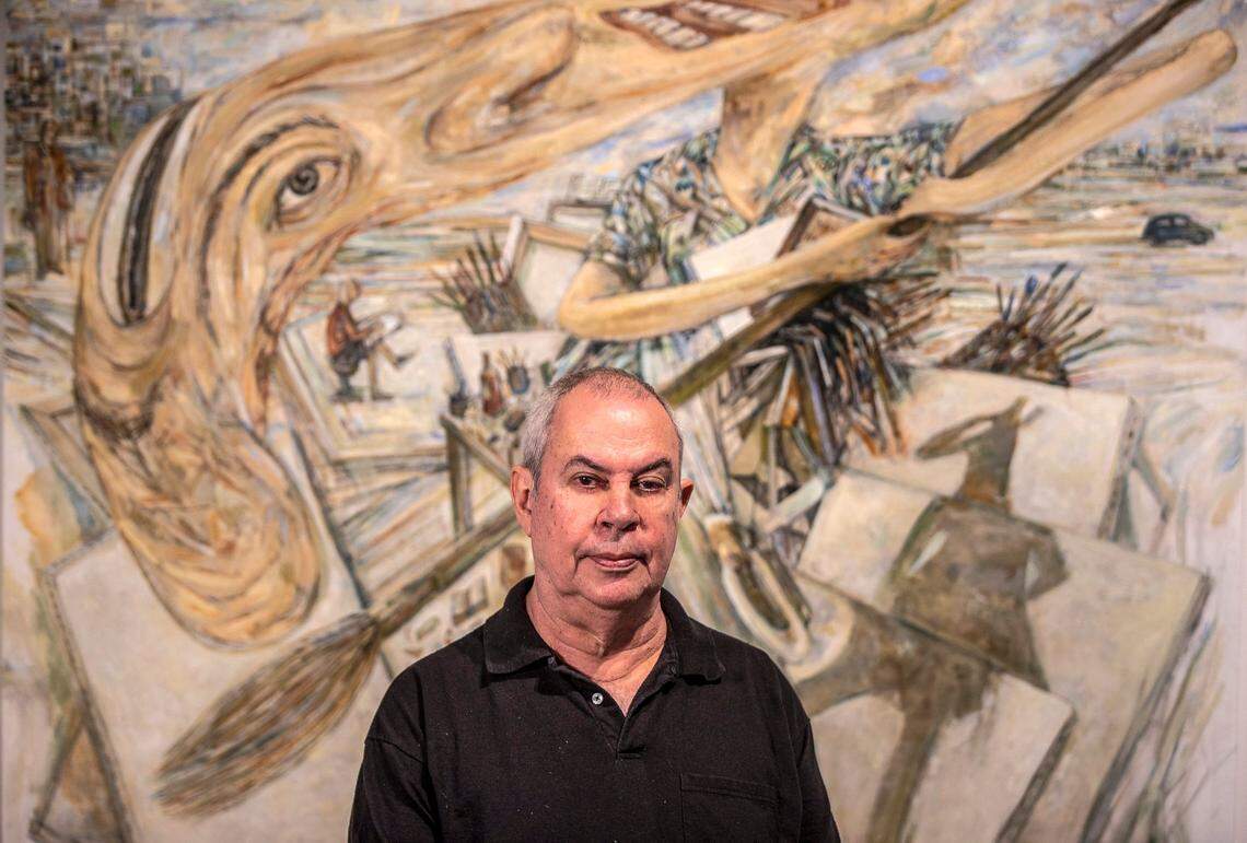 Artist Arturo Rodríguez, stands next to his piece Variation on Courbet (The Meeting) IV, 2021 oil on canvas 58 x 62 inches from his show Terra Incognita at LnS Gallery in Miami, on Wednesday, Feb. 16, 2022.