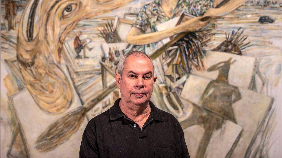 Artist Arturo Rodríguez, stands next to his piece Variation on Courbet (The Meeting) IV, 2021 oil on canvas 58 x 62 inches from his show Terra Incognita at LnS Gallery in Miami, on Wednesday, Feb. 16, 2022.