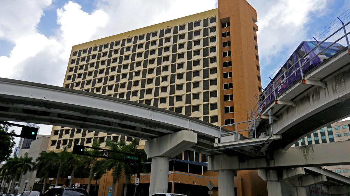 A streetside view of the Harry Cain Tower in downtown Miami. The county is closing the public housing complex over hazardous conditions, but Miami Dade College may want to redevelop the land.