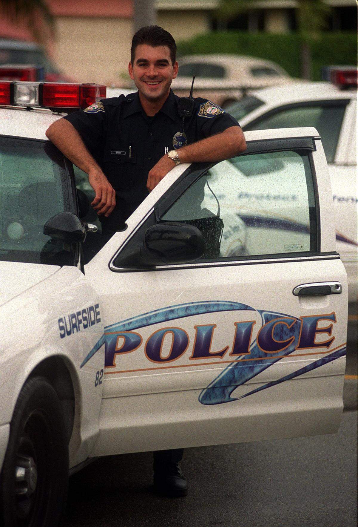 Surfside Police Officer Daniel Erben in 1999 with one of the departments new spiffy police vehicles.