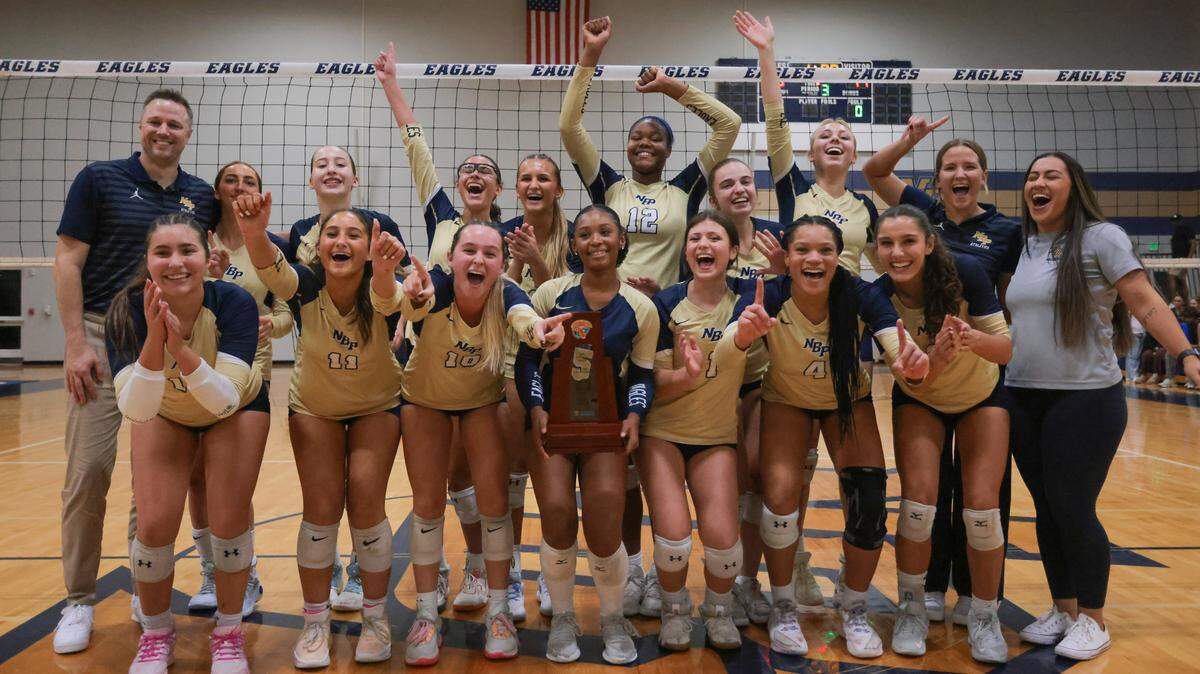 North Broward Prep volleyball players celebrate after a victory against Mater Lakes Academy during a Region 4-4A girls' volleyball regional final at North Broward Preparatory School in Coconut Creek, Florida, Wednesday, October 29, 2025.