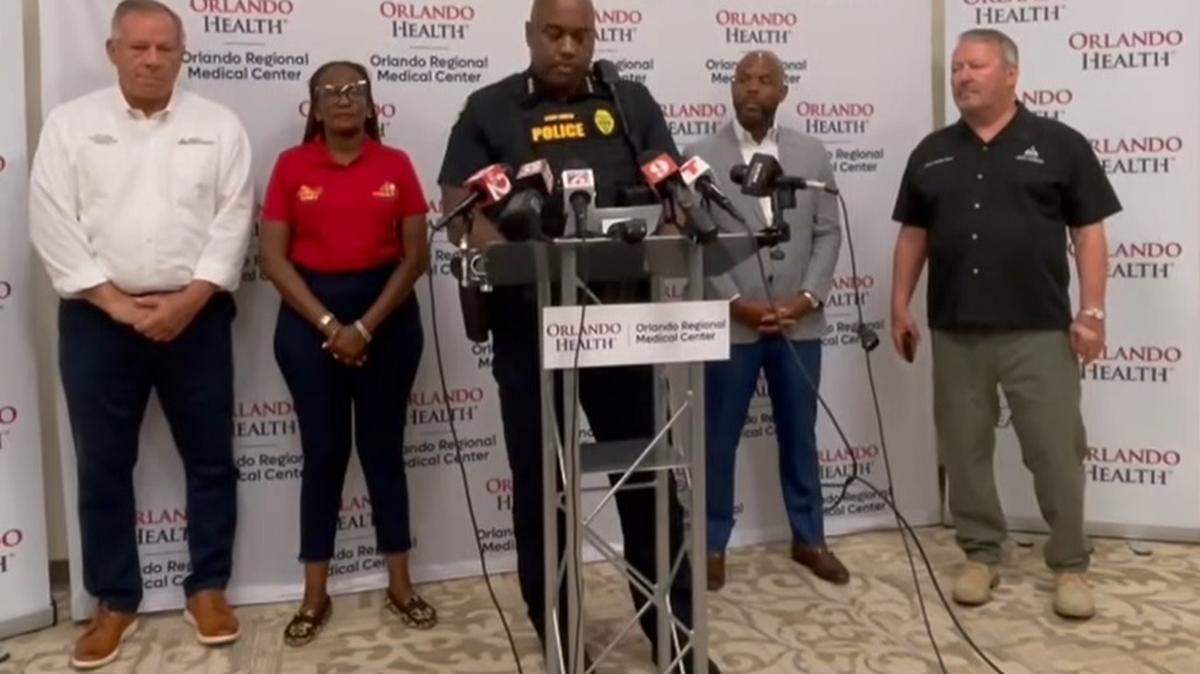 Orlando Police Chief Eric Smith, center lectern, at Orlando Health Regional Medical Center, speaks to reporters about the fatal shooting of suspect Daton Viel Saturday, Aug. 5, 2023. Viel is accused of shooting two Orlando officers Friday night. Viel was wanted for a fatal shooting in Miami in July. Smith was at the news conference alongside Orlando Mayor Buddy Dyer and surgeon, Dr. Michael Chatham, and law enforcement officers.