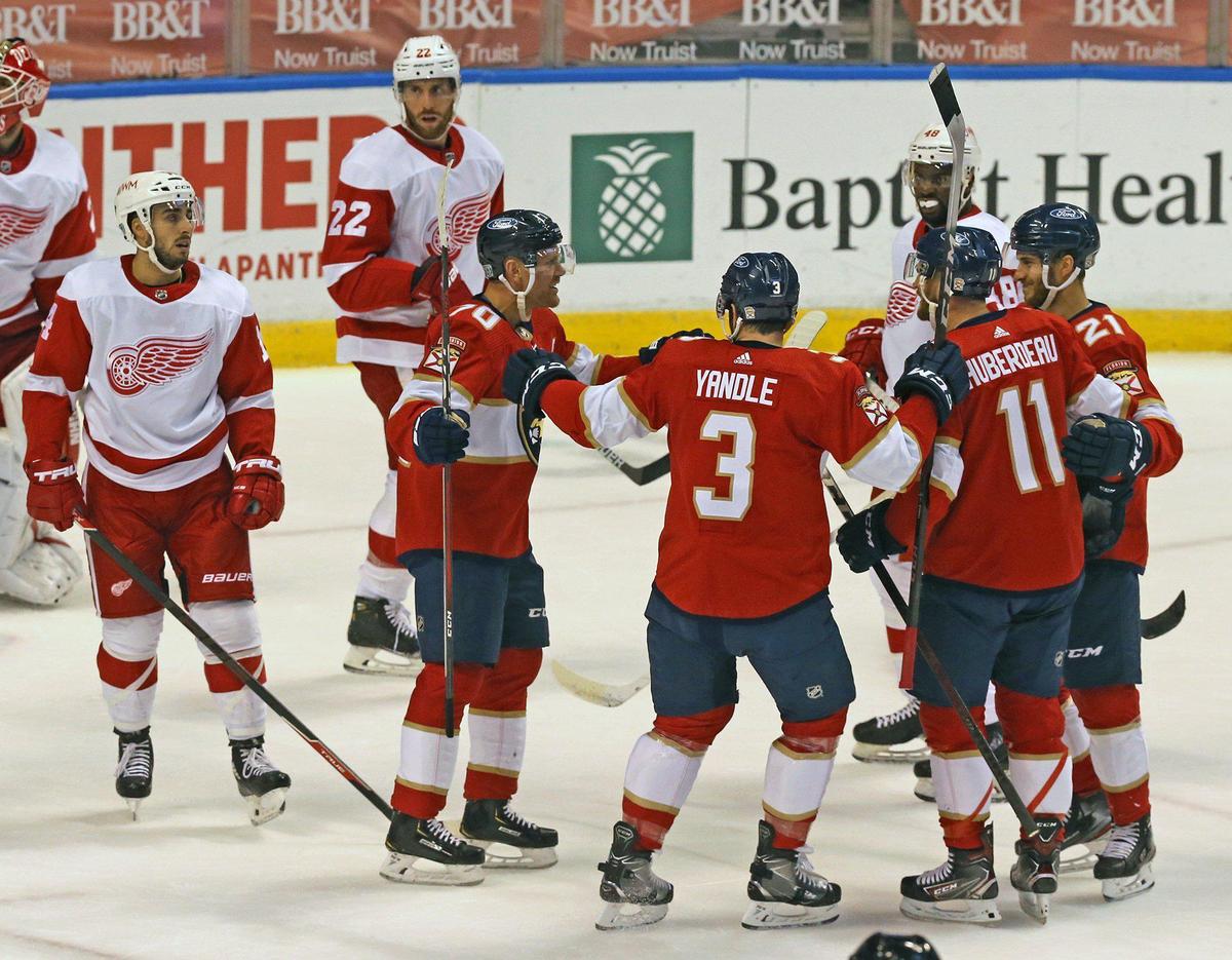 Florida Panthers celebrate after their first score by Alex Wennberg (21)in the first period as they play the Detroit Redwings at the BB&T Center in Sunrise, Florida, Tuesday, February 9, 2021.