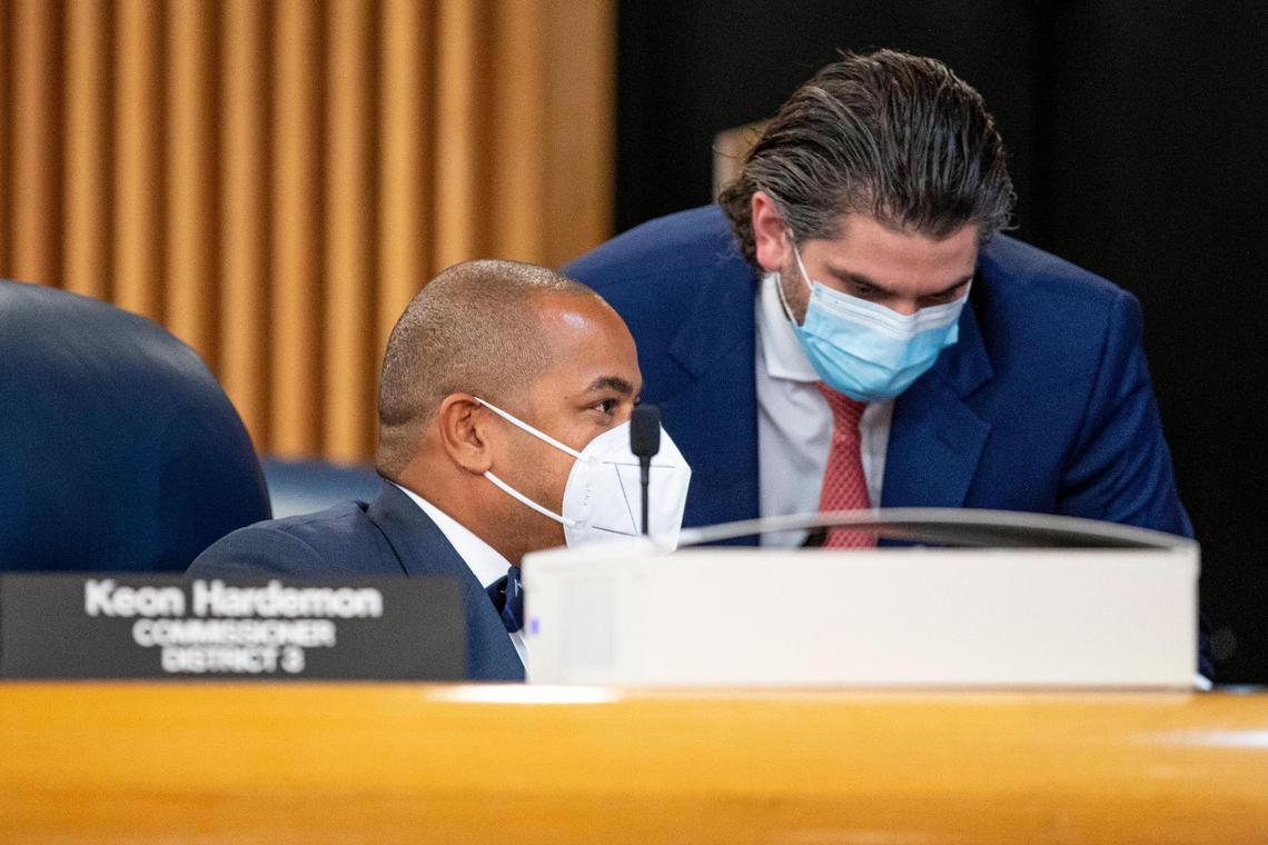 District 3 Commissioner Keon Hardemon speaks with an aide during the second budget hearing held by the Miami-Dade Board of County Commissioners at Stephen P. Clark Government Center in Miami, Florida, on Tuesday, September 28, 2021.