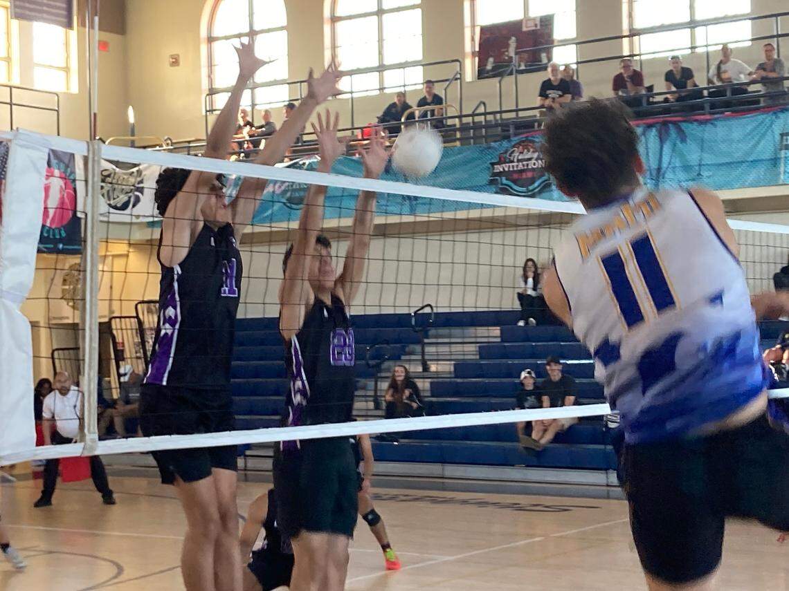 Southwest defenders attempt to block one of Miami High’s Jefferson Moreno’s spikes during Friday’s GMAC boys volleyball final at Miami High.