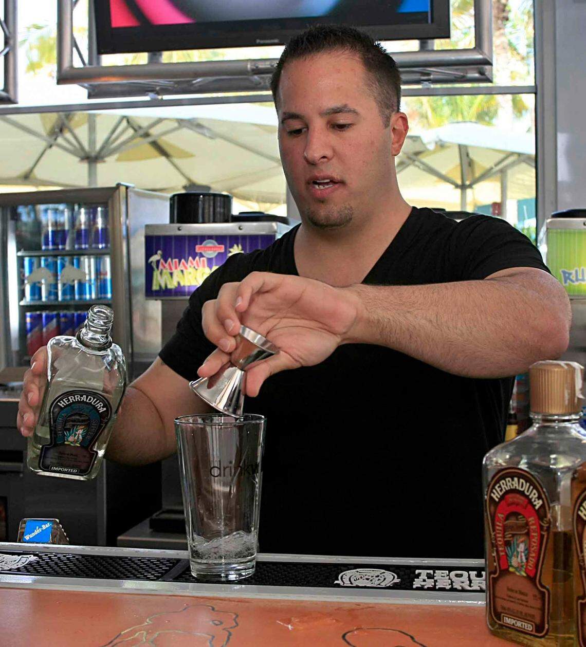 In 2009, Master Mixologist Jay Law prepares his own tequila drink “Pure Margarita,“ at The Clevelander Hotel’s bar in South Beach.