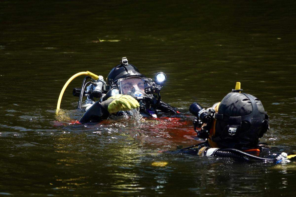 The Broward Police Department’s dive team and medical examiner worked the scene, located at 10151 SW 1st St in Plantation, where a car was found in a canal with skeletal remains of adults and children on Sunday, August 11, 2024.