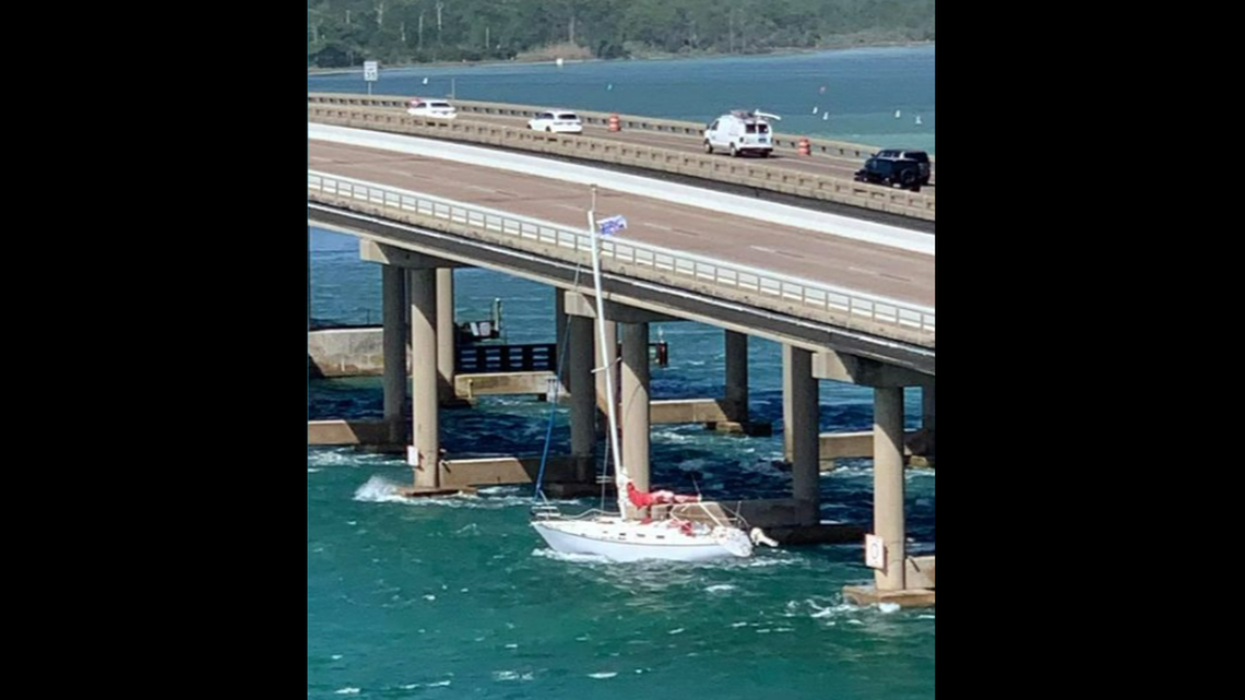 A 30-foot sailboat was pushed by high winds into a bridge on the Florida Panhandle April 12, officials say.