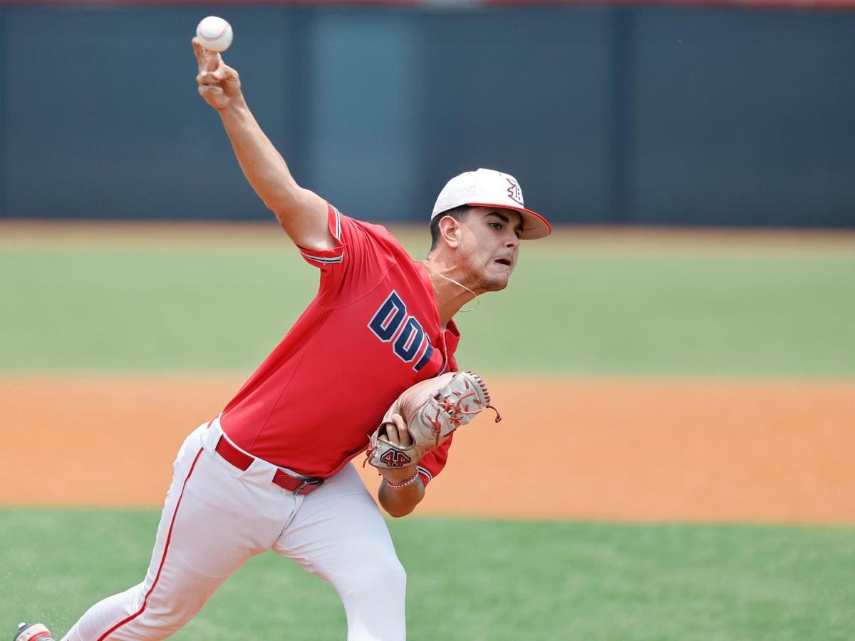 Doral Firebirds pitcher Luis Rodriguez (9) pitches in the first inning during the game against Varela Varsity Vipers at Doral Academy in Doral on Saturday, May 13, 2023.