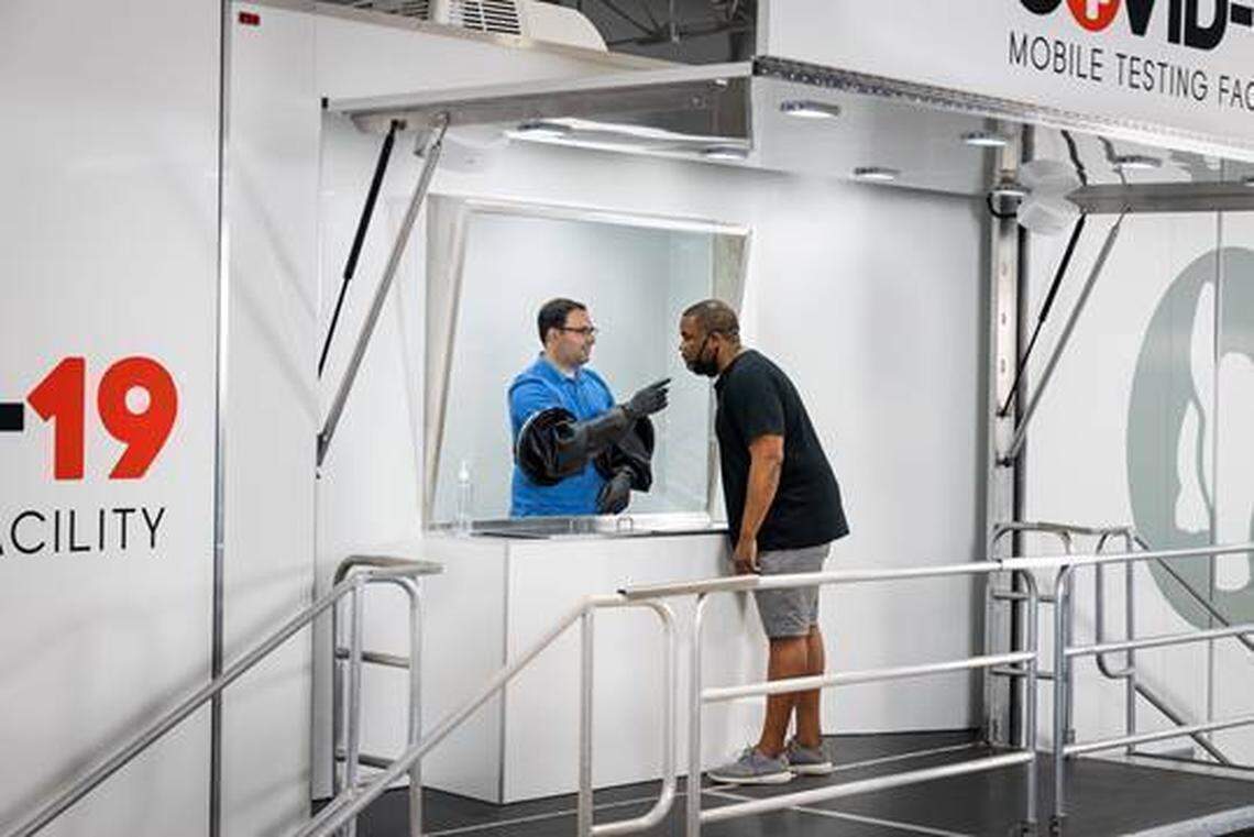 The Aardvark Mobile Health trucks have a glass pane to separate the nurse from the person being tested.