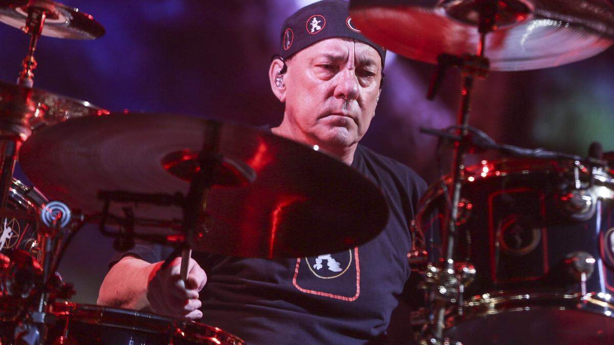 This Aug. 1, 2015 file photo shows Neil Peart of Rush performing during the final show of the R40 Tour in Los Angeles. Peart, the renowned drummer and lyricist from the band Rush, has died. His rep Elliot Mintz said in a statement Friday that he died at his home Tuesday, Jan. 7, 2020, in Santa Monica, Calif. He was 67.