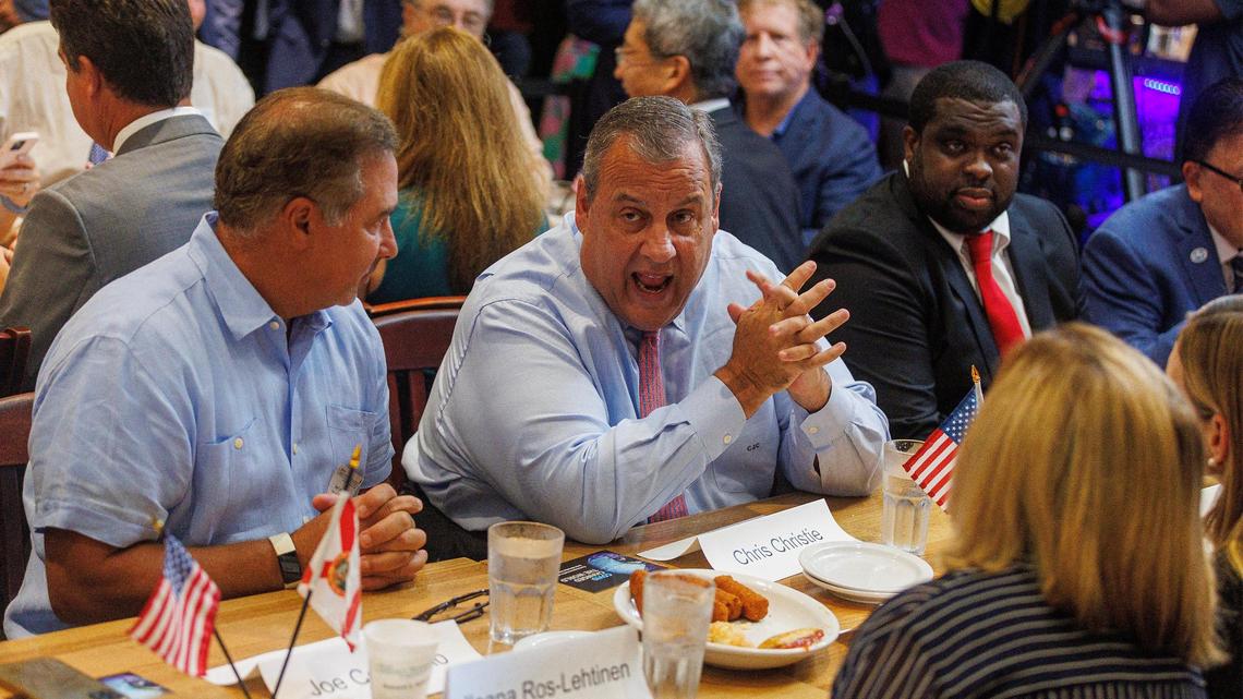 Republican presidential candidate Chris Christie chats with attendees at a town hall meeting at Casa Cuba restaurant in South Miami, on Aug. 18.