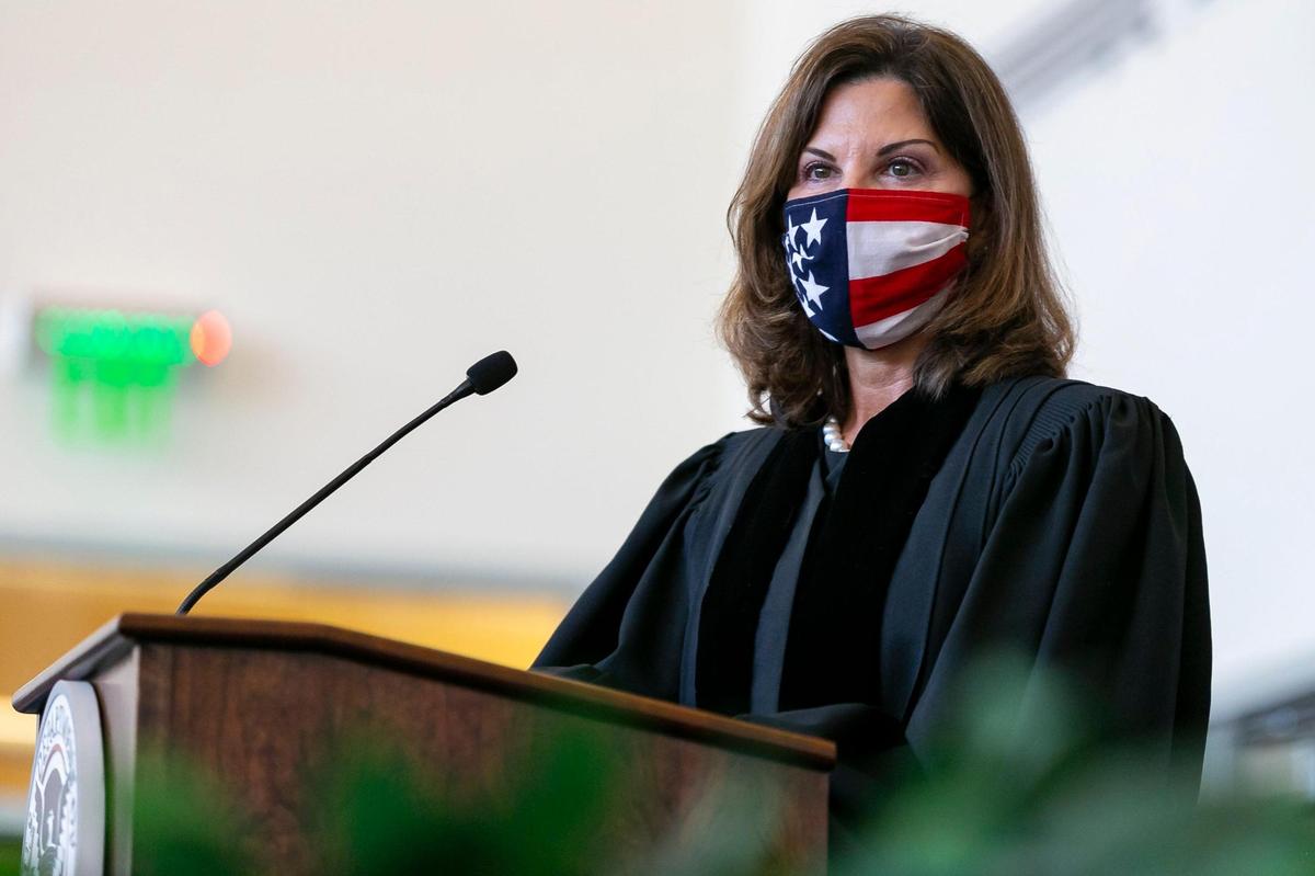 Federal Judge Beth Bloom of the United States District Court for the Southern District of Florida leads a naturalization ceremony at the U.S. Citizenship & Immigration Services District Office in Miami, Florida on Friday, October 2, 2020.