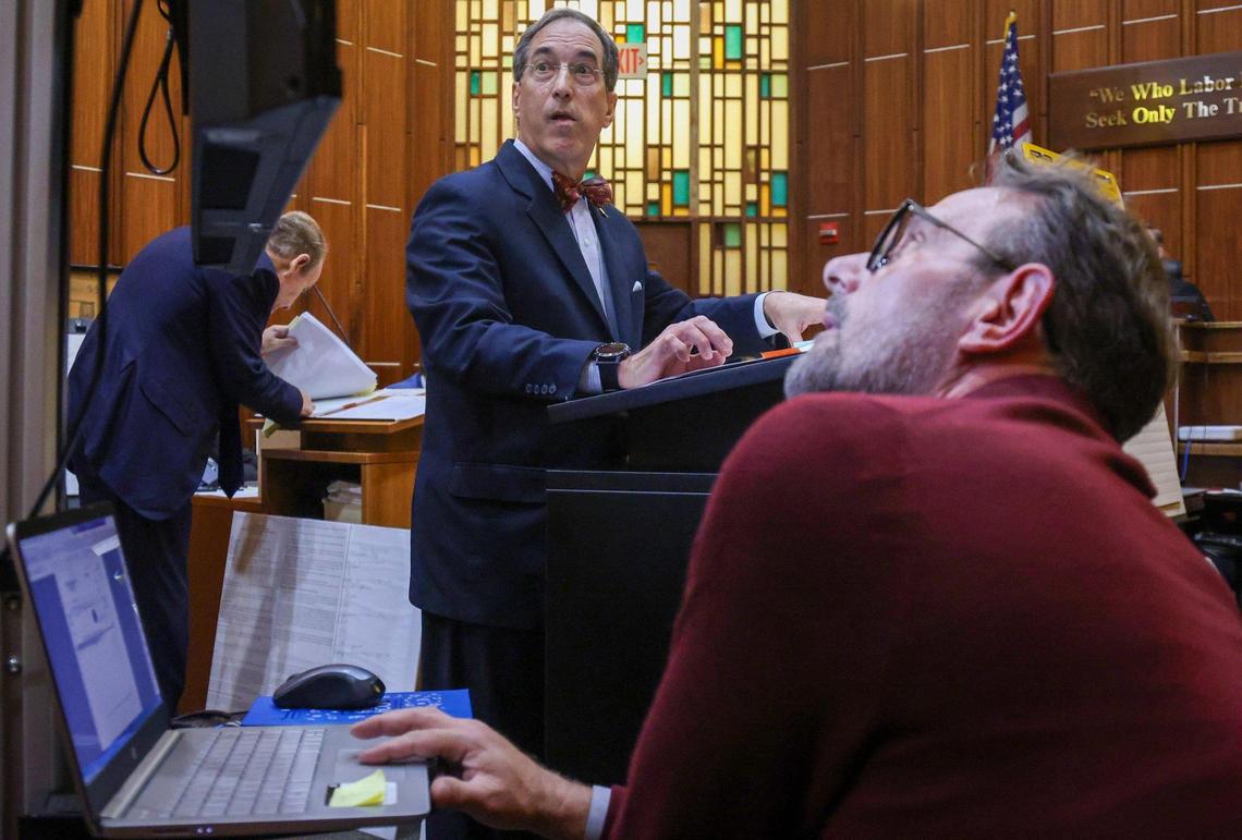 Benedict P. Kuehne, center, looks toward the screen as he prepares to give his closing argument in the public corruption trial of suspended Miami Dade Commissioner Joe Martinez inside Judge de la O’s courtroom at the Richard E. Gerstein Justice Building in Miami, Florida, on Thursday, November 7, 2024.