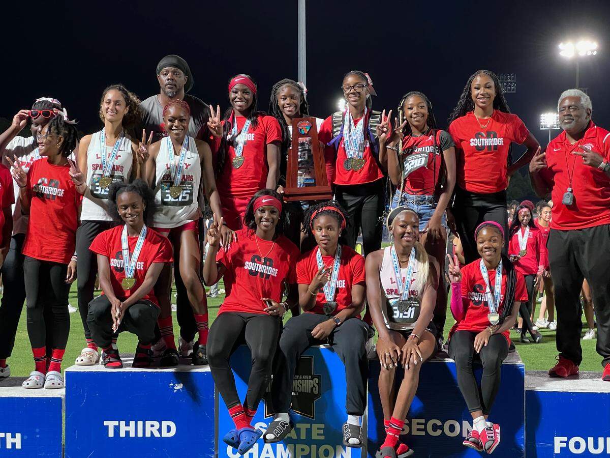 Members of the Southridge girls’ track and field team celebrate a state runner-up finish in Class 4A on Saturday at Hodges Stadium in Jacksonville, Fla.