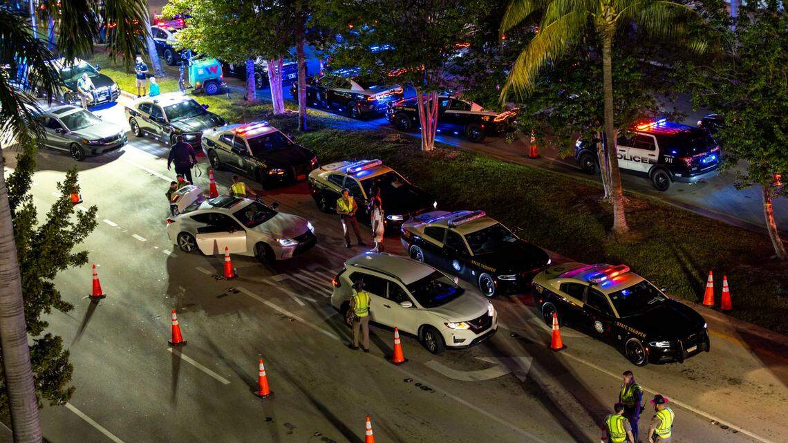 Motorists are stopped and searched during a DUI checkpoint on Fifth Street between Meridian and Washington Avenues in Miami Beach, Florida, on Saturday, March 25, 2023. A similar sobriety checkpoint returns on March 8-9 and March 15-16, 2024.