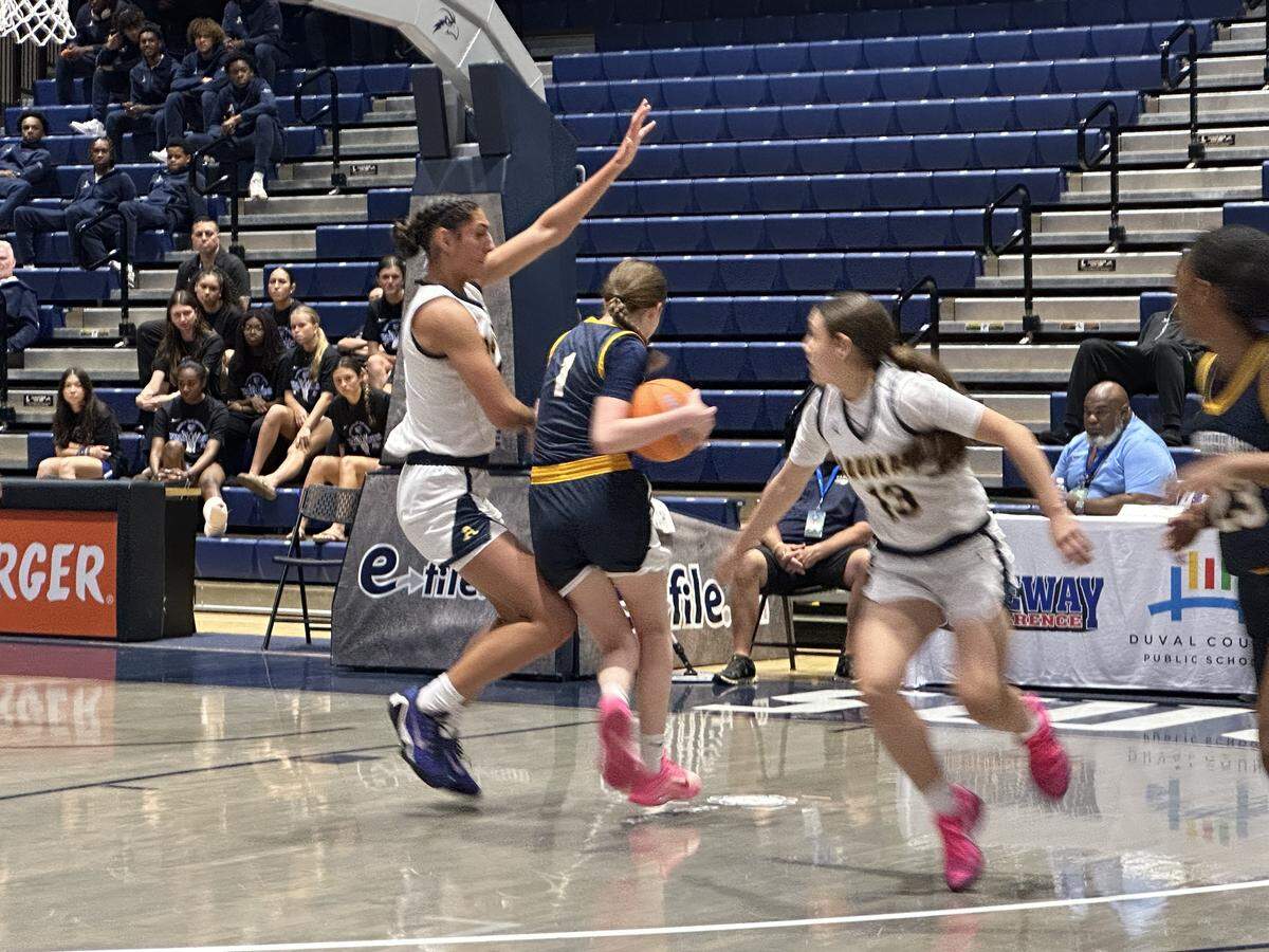 St. Thomas Aquinas’ Isabella Sangha protects the paint during Thursday’s Class 6A girls’ basketball state semifinal against Tampa Steinbrenner at UNF Arena in Jacksonville, Fla.