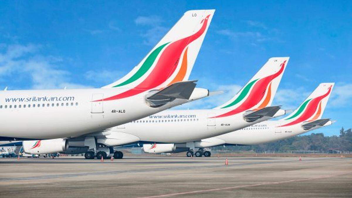 SriLankan Airlines jets on the runway.