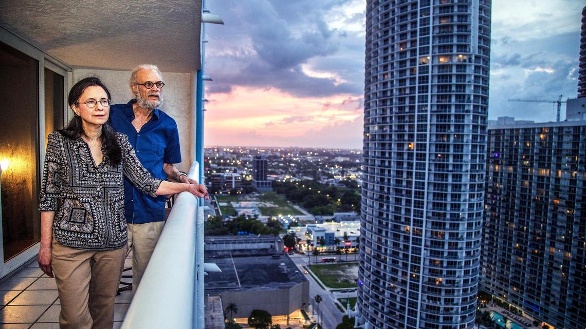Dr. Rhonda Rosenberg and David Rosenberg stand on the balcony of their apartment at The Grand Condominium located at 1717 N Bayshore Dr. in the trendy Edgewater neighborhood on Thursday, June 01, 2023.