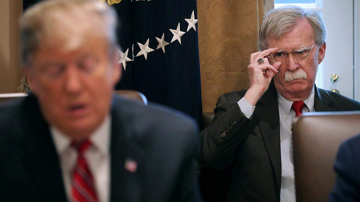 President Trump, with National Security Adviser John Bolton, has imposed the strongest sanctions yet on Venezuela.