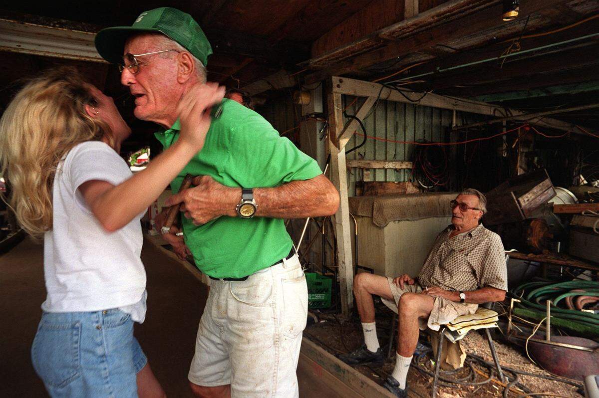 In 2000, Cathy Lisanti gives Jim “Jimbo” Luznar Sr. a big hug after beating him in bocce ball.