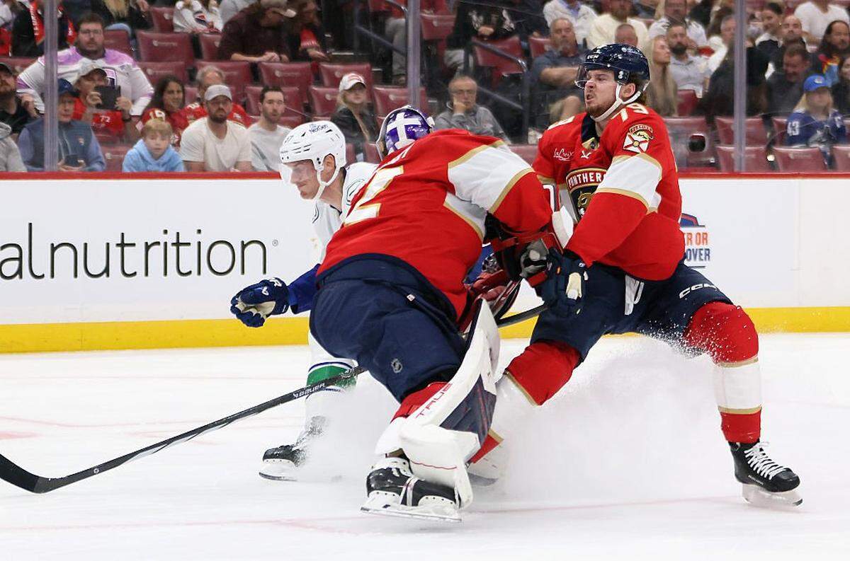 SUNRISE, FLORIDA - NOVEMBER 17: Cole Schwindt #79 of the Florida Panthers collides with Sergei Bobrovsky #72 of the Florida Panthers during the first period against the Vancouver Canucks at Amerant Bank Arena on November 17, 2025 in Sunrise, Florida. (Photo by Bruce Bennett/Getty Images)