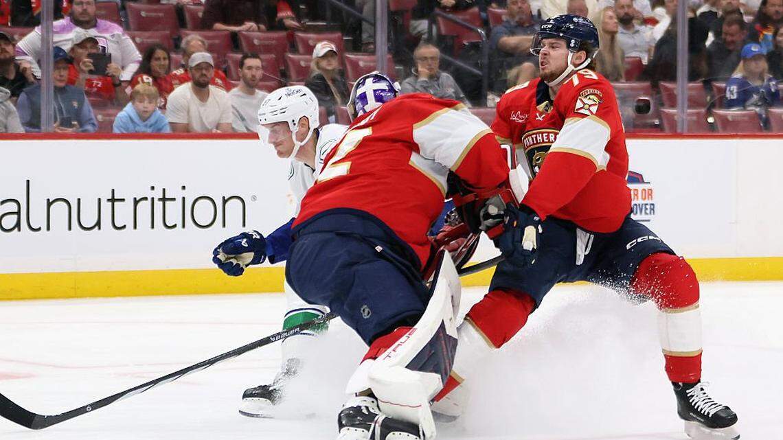 SUNRISE, FLORIDA - NOVEMBER 17: Cole Schwindt #79 of the Florida Panthers collides with Sergei Bobrovsky #72 of the Florida Panthers during the first period against the Vancouver Canucks at Amerant Bank Arena on November 17, 2025 in Sunrise, Florida. (Photo by Bruce Bennett/Getty Images)
