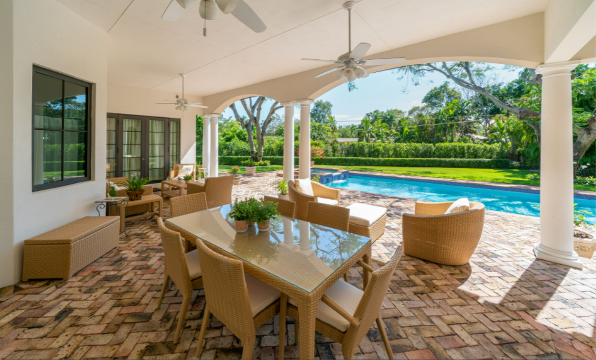 The covered terrace at Romero Britto’s Pinecrest house has an expansive view.
