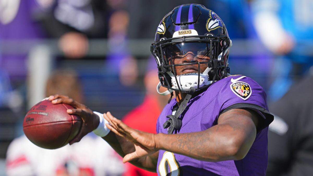 Baltimore Ravens quarterback Lamar Jackson (8) faces Joe Burrow and the Cincinnati Bengals in an NFC North rivalry to open NFL Week 11 Thursday night in Baltimore.