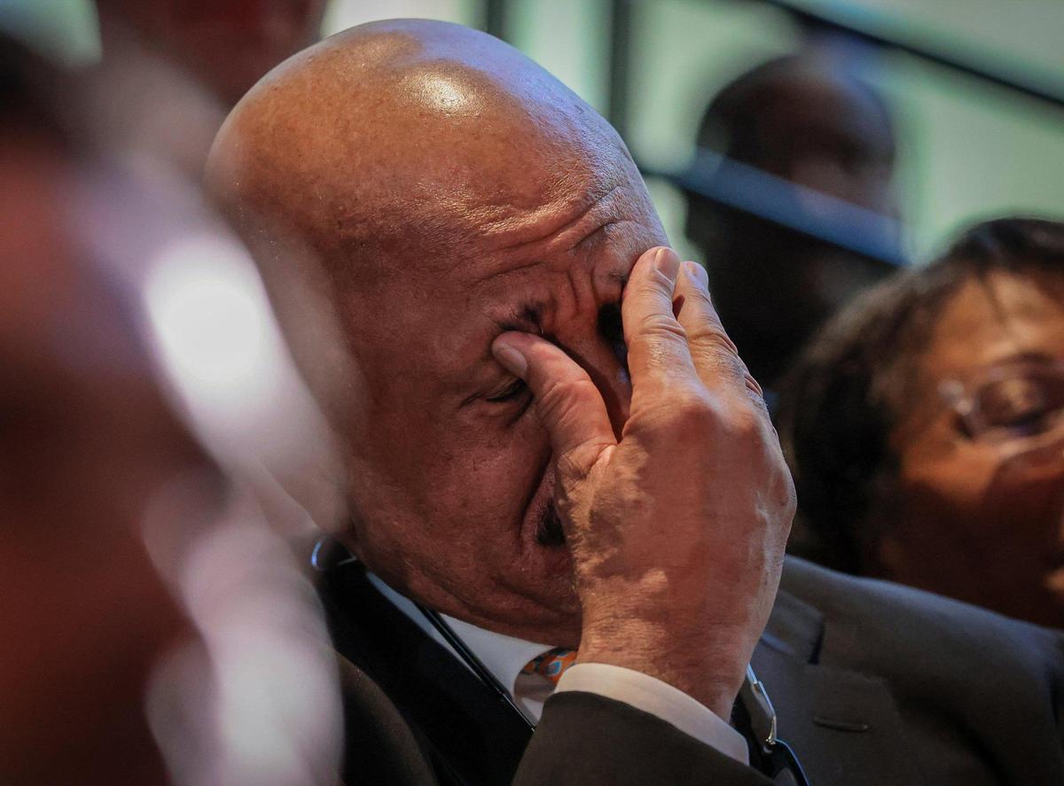 Sitting next to his wife, former NBA star and father of Jai Lucas, John Lucas II, left, holds back tears during his son’s remarks after being introduced by the University of Miami as the new head coach of its men’s basketball program, marking a significant move aimed at revitalizing the team and enhancing its competitive edge in college basketball at UM Lakeside Auditorium on Monday, March 10, 2025, in Coral Gables, Florida.