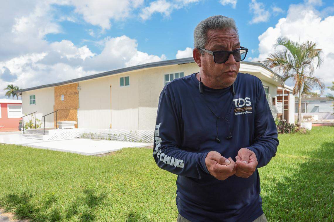 Karel Hernández speaks while standing in front of his mobile home after a court ordered his eviction from the property at the Li'l Abner Mobile Home Park in Sweetwater, Florida, Monday, October 20, 2025.