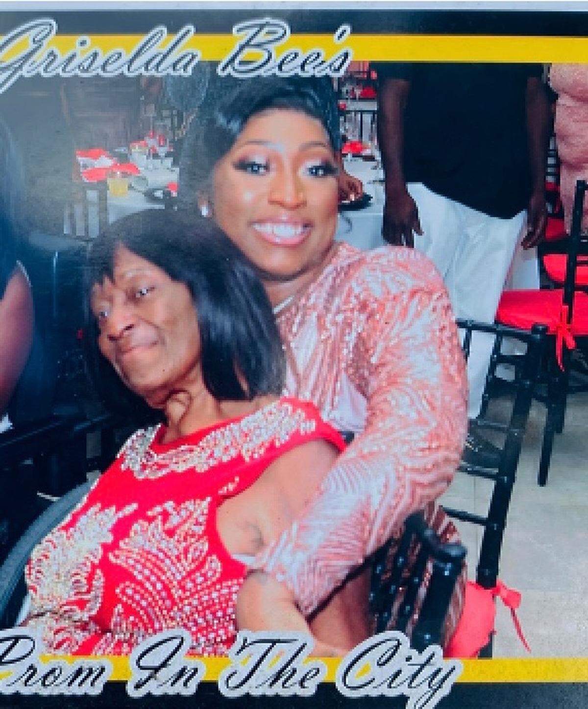 Elizabeth Level, known affectionately as Miss Liz, is pictured in this undated photo in the arms of her granddaughter Griselda Bee, a local musician.
