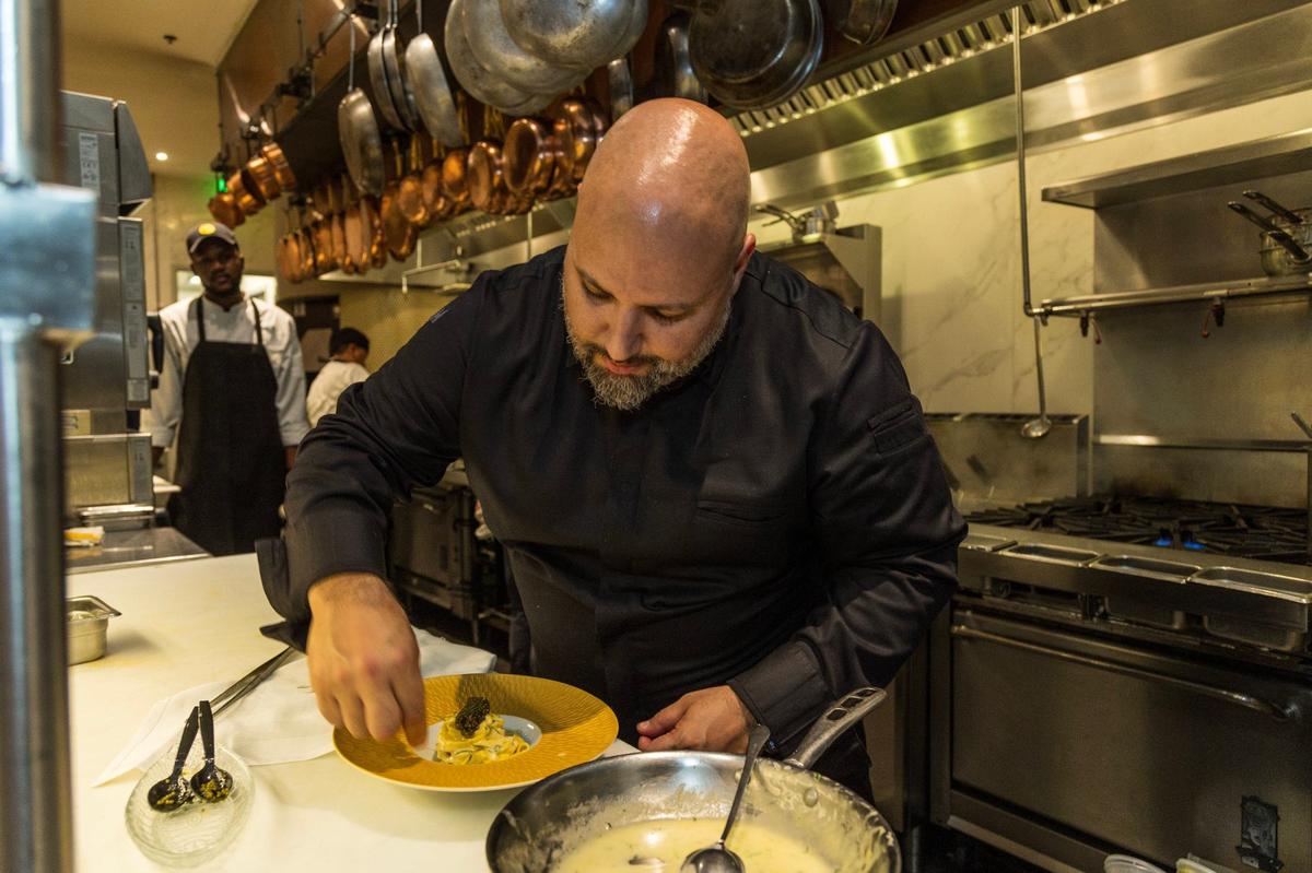 Chef Danny Ganem prepares caviar carbonara at Fiola in Coral Gables.
