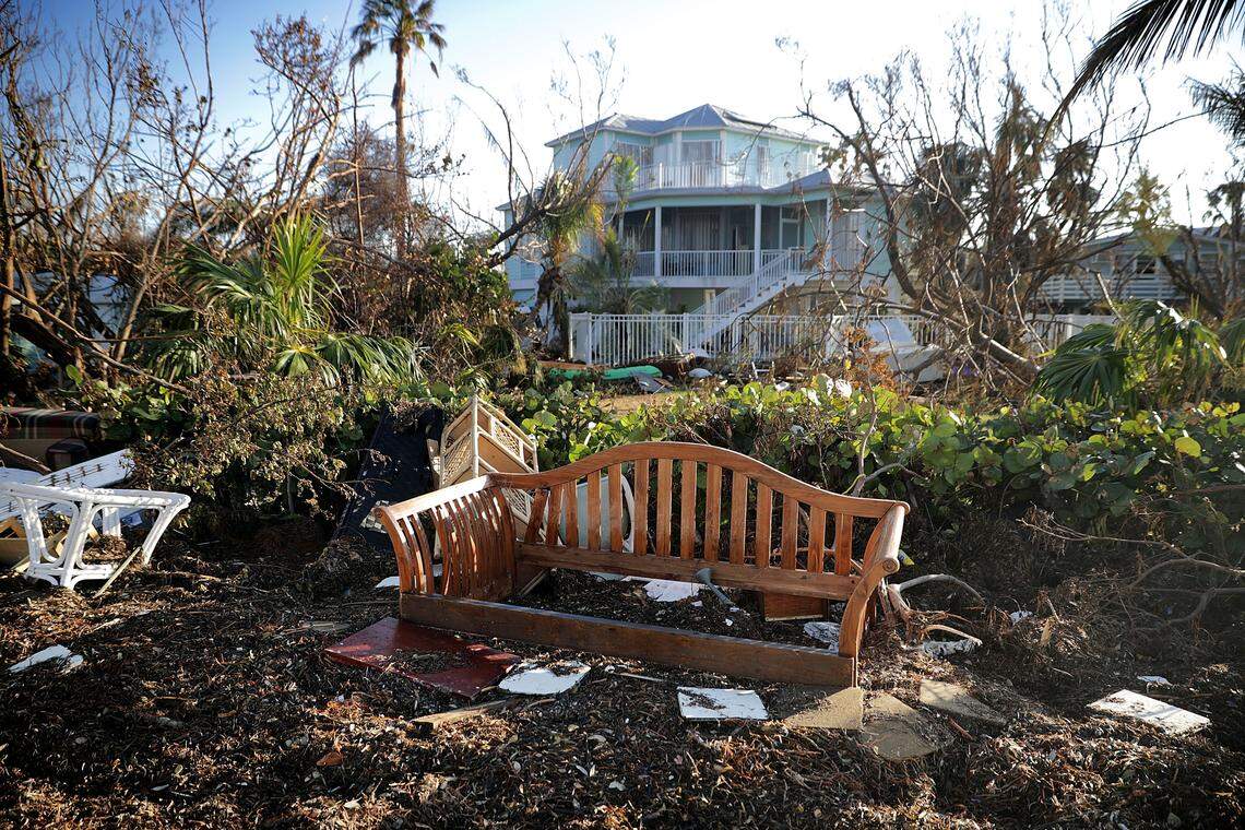 Furniture carried away by Hurricane Irma's storm surge is strewn next to the road in Cudjoe Key on Sept. 15, 2017, two days after the storm. Emergency contracts to haul away the debris were awarded by Gov. Rick Scott, despite local arrangements already in place.