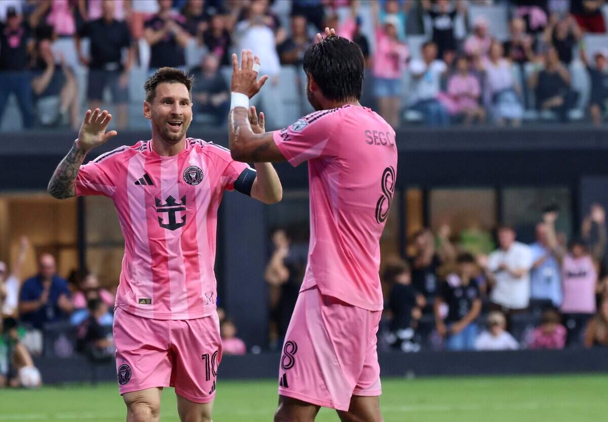 Inter Miami CF forward Lionel Messi (10), celebrates with team mate Inter Miami CF midfielder Telasco Segovia (8) after scoring the first goal during the first half of the Inter Miami vs Portland Timbers soccer game at the Nu Stadium on Sunday, May 17, 2026, in Miami, Florida.