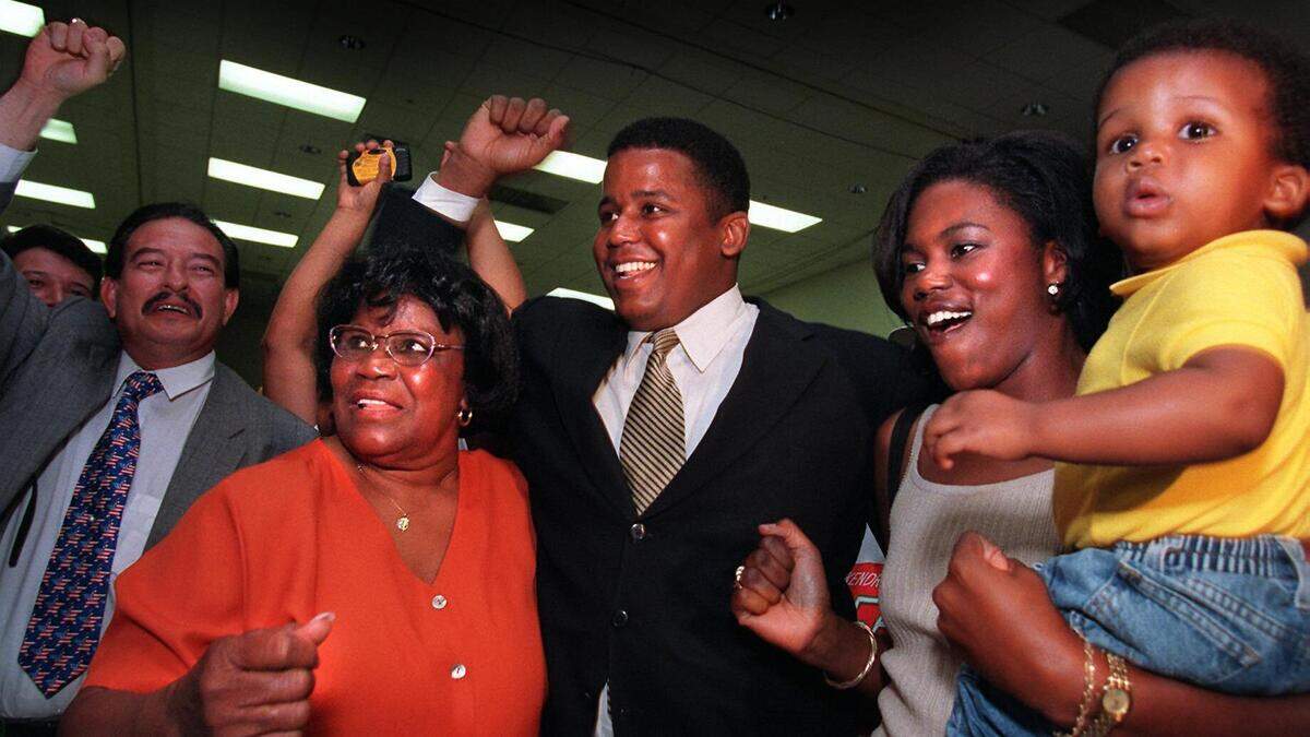 From the archives: The Meek Family--L to R--U.S. Representative Carrie P. Meek and son Kendrick Meek, his wife Leslie Meek and son Kendrick Meek Jr. at a victory party held at the Caleb Center, on Sept. 1, 1998.