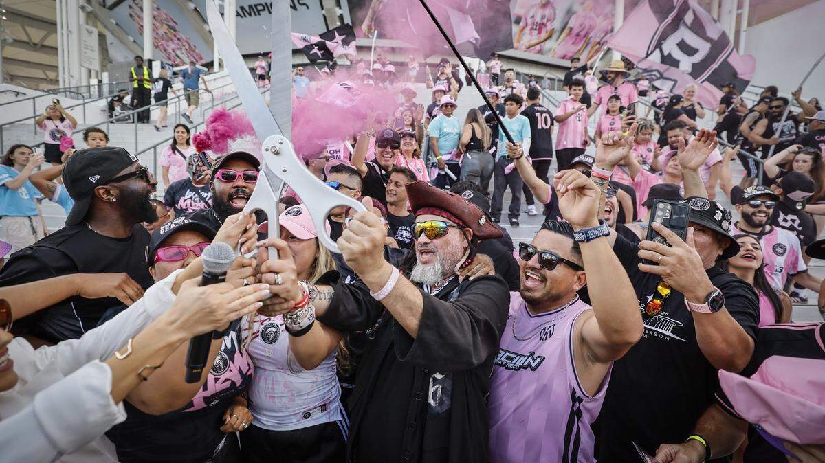 Fans react during a ribbon cutting event at Nu Stadium in Miami Freedom Park ahead of an MLS soccer match between Inter Miami CF and Austin FC at Nu Stadium in Miami Freedom Park on Saturday, April 4, 2026, in Miami, Florida,